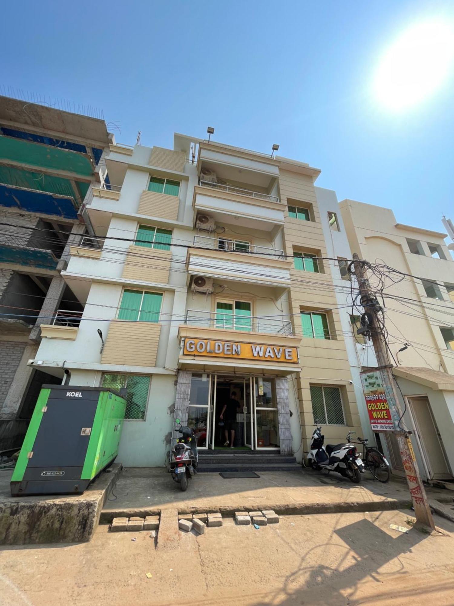 Hotel Golden Wave Puri Bagian luar foto